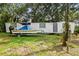 Newly remodeled mobile home with boat at 5824 Portal Rd, New Port Richey, FL 34655