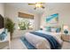 Comfortable bedroom with tile flooring, neutral walls, and a bright window overlooking tropical landscaping at 4949 Sandy Brook Cir, Wimauma, FL 33598