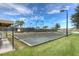 Scenic bocce ball courts surrounded by lush landscaping offer leisurely recreation at 4949 Sandy Brook Cir, Wimauma, FL 33598