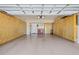 Spacious garage with custom cabinets for optimal storage solutions at 4949 Sandy Brook Cir, Wimauma, FL 33598