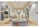 Elegant lobby area with comfortable seating, stylish decor, and ample natural light for a welcoming ambiance at 4949 Sandy Brook Cir, Wimauma, FL 33598