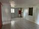 Spacious living room with tile flooring and plenty of natural light at 709 1St Ne Ave, Largo, FL 33770