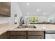 Modern kitchen sink and granite countertop at 12083 Pine Club Cir, Weeki Wachee, FL 34614