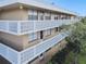 Apartment building with balconies and geometric designs at 5095 Bay Ne St # 306, St Petersburg, FL 33703
