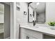 Stylish bathroom with a contemporary vanity and mirror at 5095 Bay Ne St # 306, St Petersburg, FL 33703