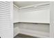 Spacious walk-in closet with ample shelving and hanging space at 5095 Bay Ne St # 306, St Petersburg, FL 33703