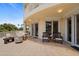 Outdoor patio with comfortable seating and stunning views at 1200 Gulf Blvd # 105, Clearwater Beach, FL 33767