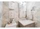 Sophisticated bathroom with gray vanity and elegant mirror at 1200 Gulf Blvd # 105, Clearwater Beach, FL 33767