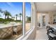 View of a spacious patio with seating area overlooking lush landscaping at 1200 Gulf Blvd # 105, Clearwater Beach, FL 33767
