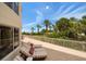 Relaxing patio with striped lounge chairs and ocean views at 1200 Gulf Blvd # 105, Clearwater Beach, FL 33767