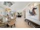 Elegant dining room features large artwork and open floor plan at 1200 Gulf Blvd # 105, Clearwater Beach, FL 33767
