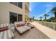 Comfortable patio with lounge chairs and ocean views at 1200 Gulf Blvd # 105, Clearwater Beach, FL 33767