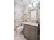 Stylish bathroom with gray vanity and marble countertop at 1200 Gulf Blvd # 105, Clearwater Beach, FL 33767