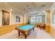 Well-equipped game room featuring a billiard table at 1200 Gulf Blvd # 105, Clearwater Beach, FL 33767