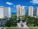 Luxury beachfront community entrance with lush landscaping at 1200 Gulf Blvd # 105, Clearwater Beach, FL 33767