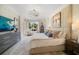 Bright and airy main bedroom with a king-size bed and access to a private balcony at 1200 Gulf Blvd # 105, Clearwater Beach, FL 33767