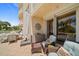 Relaxing patio with comfortable seating and access to indoor living space at 1200 Gulf Blvd # 105, Clearwater Beach, FL 33767