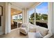 Relaxing sitting area with comfy chairs and large windows offering scenic views at 1200 Gulf Blvd # 105, Clearwater Beach, FL 33767