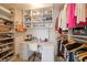 Large walk-in closet with custom shelving and built-in workspace at 1200 Gulf Blvd # 105, Clearwater Beach, FL 33767