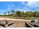 Spacious patio with lounge chairs and stunning outdoor views at 1200 Gulf Blvd # 105, Clearwater Beach, FL 33767