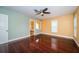 Main bedroom with hardwood floors and ensuite bathroom at 7051 Hibiscus S Ave, South Pasadena, FL 33707