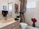 Clean bathroom with shower, toilet and vanity at 13217 Thoroughbred Dr, Dade City, FL 33525
