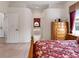 Main bedroom with access to bathroom and closet at 13217 Thoroughbred Dr, Dade City, FL 33525