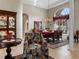 Open-concept dining room area bathed in natural light from a large window at 13217 Thoroughbred Dr, Dade City, FL 33525
