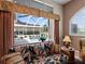 Relaxing living room with pool view at 13217 Thoroughbred Dr, Dade City, FL 33525