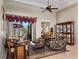 Bright living room with vaulted ceilings and decorative furnishings at 13217 Thoroughbred Dr, Dade City, FL 33525