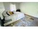 Bright bedroom with a comfortable bed and plenty of space at 1398 Shady Pine Way # H3, Tarpon Springs, FL 34688