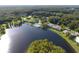 Lakeside community with resort-style pool and green space at 1398 Shady Pine Way # H3, Tarpon Springs, FL 34688