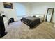 Spacious bedroom with large window and neutral carpeting at 1398 Shady Pine Way # H3, Tarpon Springs, FL 34688