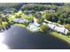 Community boasts a lakefront pool and lush landscaping at 1398 Shady Pine Way # H3, Tarpon Springs, FL 34688