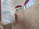 Large walk-in shower with glass block feature at 13217 Thoroughbred Dr, Dade City, FL 33525