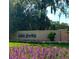 Lake Jovita community entrance with landscaping at 13217 Thoroughbred Dr, Dade City, FL 33525
