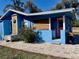 Charming blue cottage with a spacious yard at 1478 Alternate Keene Rd, Largo, FL 33771