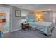 Bedroom with a queen bed and view of the kitchen at 1478 Alternate Keene Rd, Largo, FL 33771