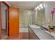 Updated bathroom with a walk-in shower and gray vanity at 1478 Alternate Keene Rd, Largo, FL 33771