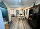 Bright dining area adjacent to the living room at 1478 Alternate Keene Rd, Largo, FL 33771