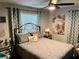 Bedroom with a queen bed and stylish decor at 1478 Alternate Keene Rd, Largo, FL 33771