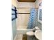 Clean bathroom with a tub, shower, and updated fixtures at 1478 Alternate Keene Rd, Largo, FL 33771