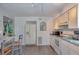 White kitchen with refrigerator, oven, and microwave at 1478 Alternate Keene Rd, Largo, FL 33771