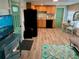 Cozy kitchen featuring modern appliances and light flooring at 1478 Alternate Keene Rd, Largo, FL 33771