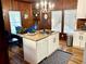 Updated kitchen with white cabinets and granite countertops at 1478 Alternate Keene Rd, Largo, FL 33771