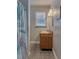Simple bathroom with a single vanity and shower/tub combo at 1478 Alternate Keene Rd, Largo, FL 33771