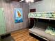 Bedroom with a bunk bed and futon at 1478 Alternate Keene Rd, Largo, FL 33771