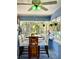 Sunroom with table and chairs, perfect for relaxing at 1478 Alternate Keene Rd, Largo, FL 33771