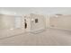Open concept living area with tile floors and kitchen bar at 3234 Jackson Dr, Holiday, FL 34691