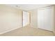 Cozy carpeted bedroom featuring a double door closet at 3234 Jackson Dr, Holiday, FL 34691
